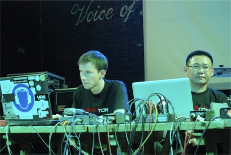 Er Dao & Piotr Michalowski on stage in Wuhan